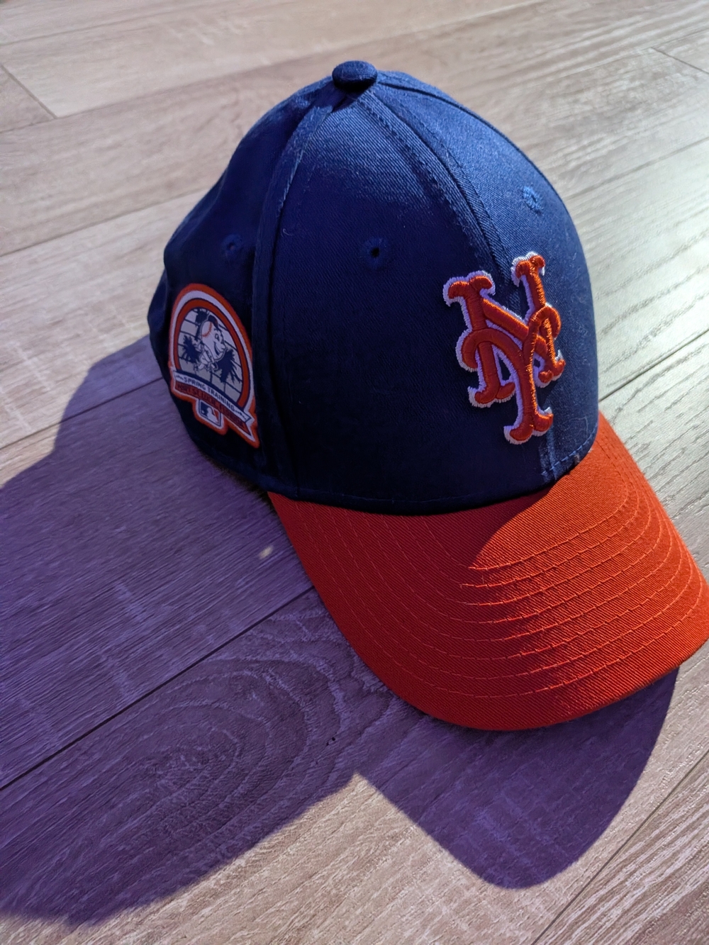 New Era Kids Navy and Orange MLB Cap with Team Patch